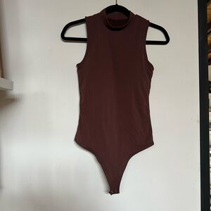 Klassy Network Brown Sleeveless Bodysuit with High Neck